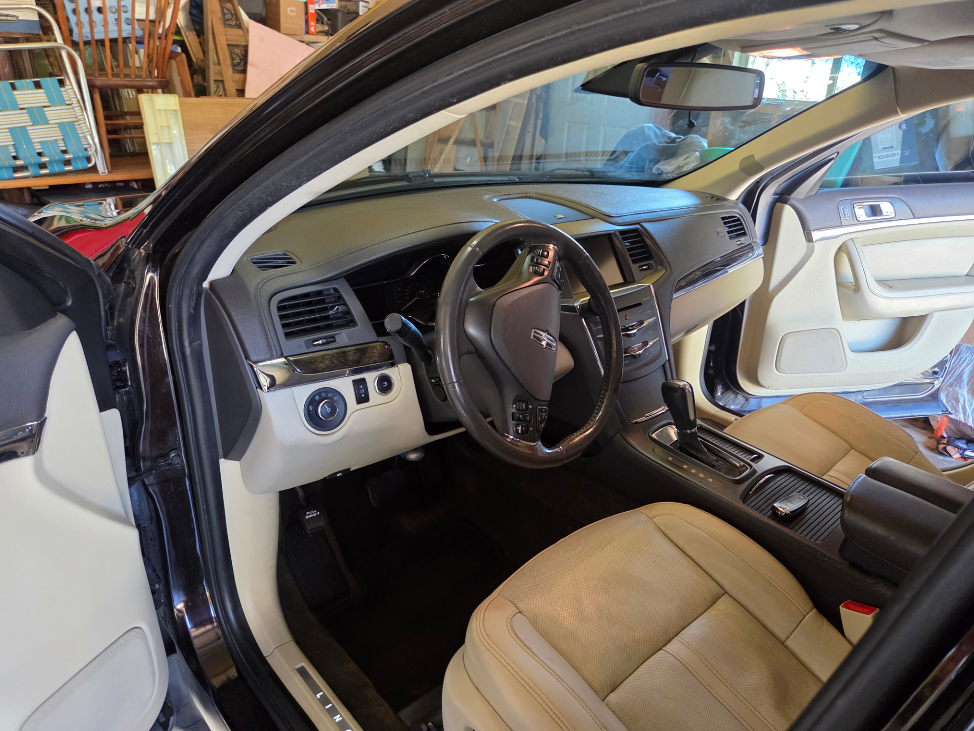 Freshly detailed Lincoln interior with cream leather seats